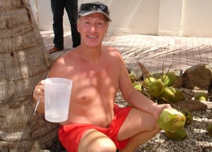 Tarzan and Jayn with our coconuts in Aruba.